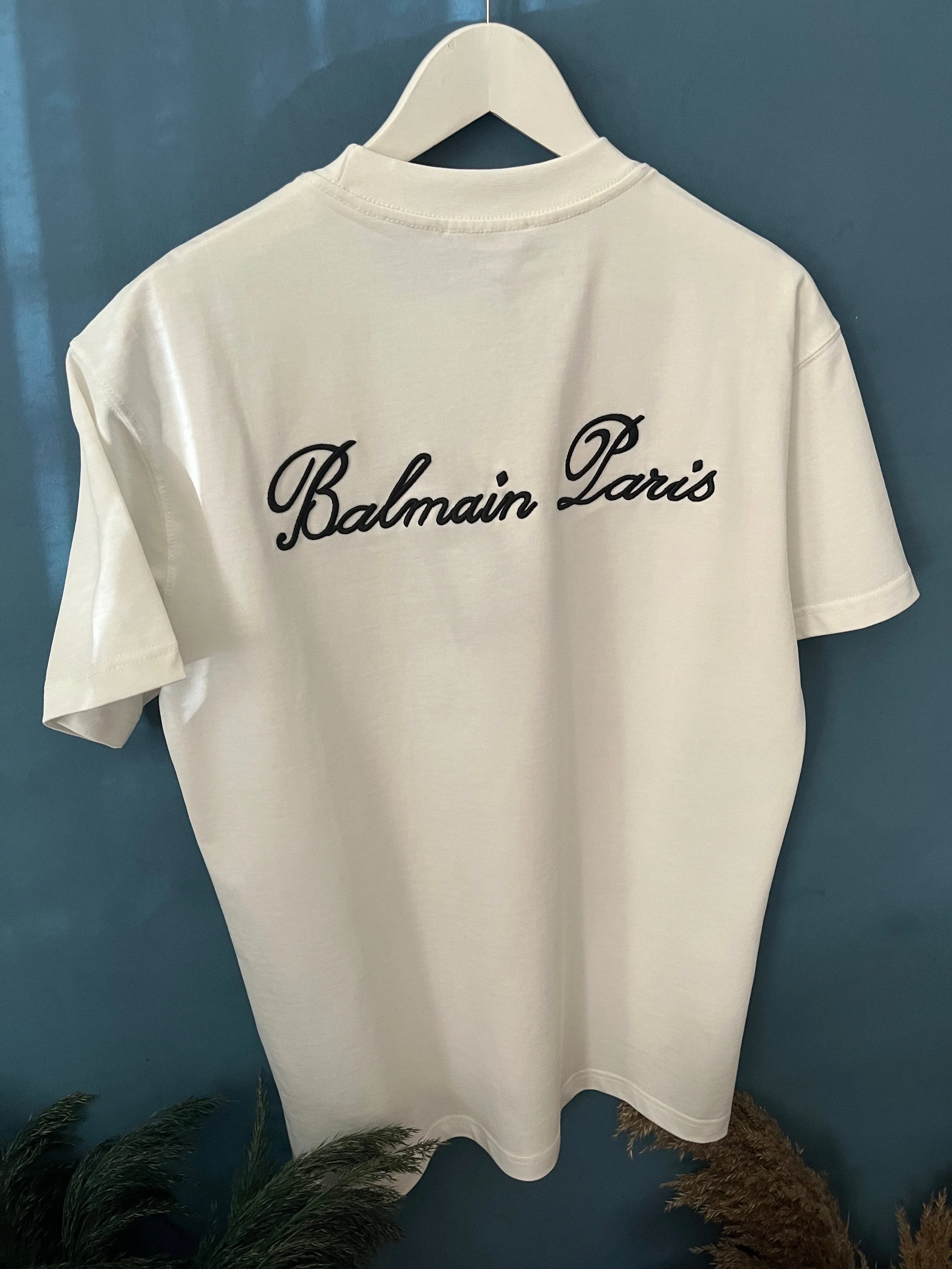 Balmain "Signature Logo Embroidered" T-Shirt styled in White for Spring/Summer 2024